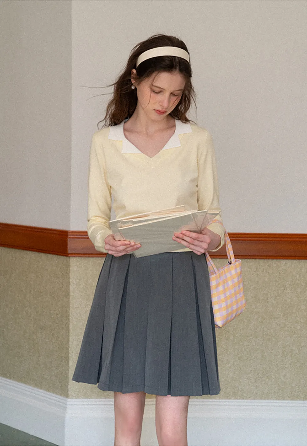 Pleated skirt with front bow detail