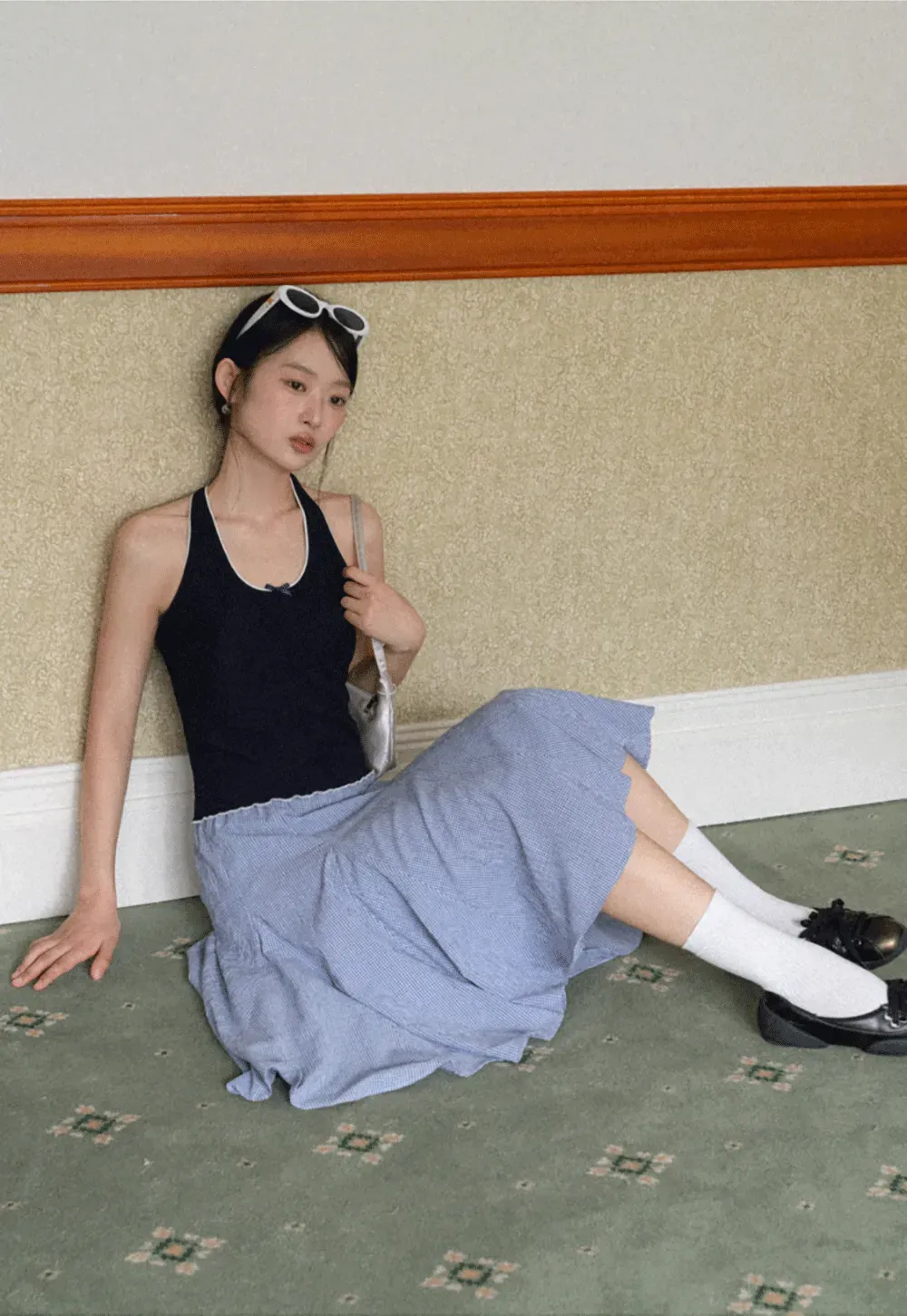 Halter neck tank top with thin straps and bow detail