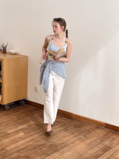 Wide leg jeans with embroidered hem details