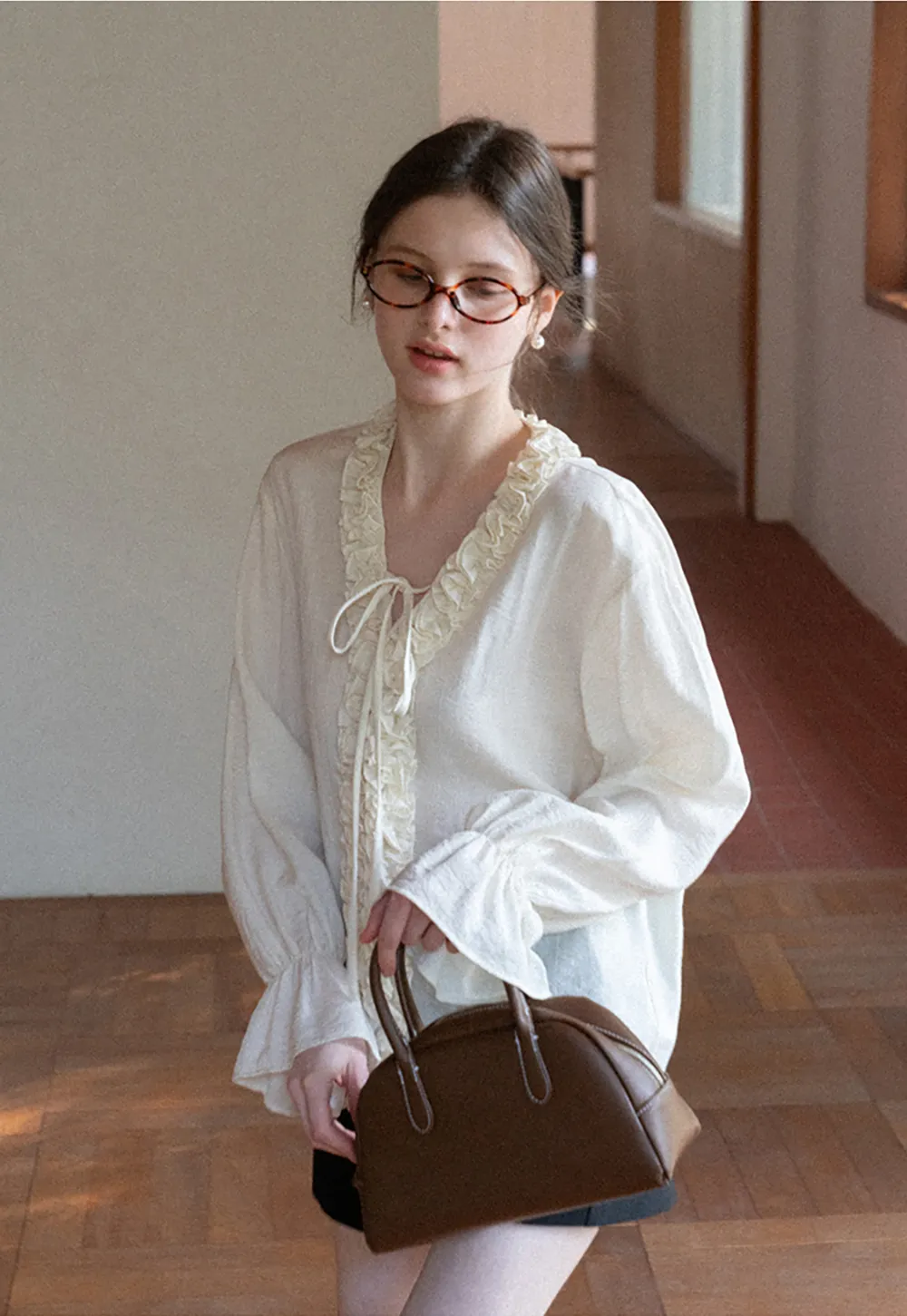 High waist pleated shorts with flared hem