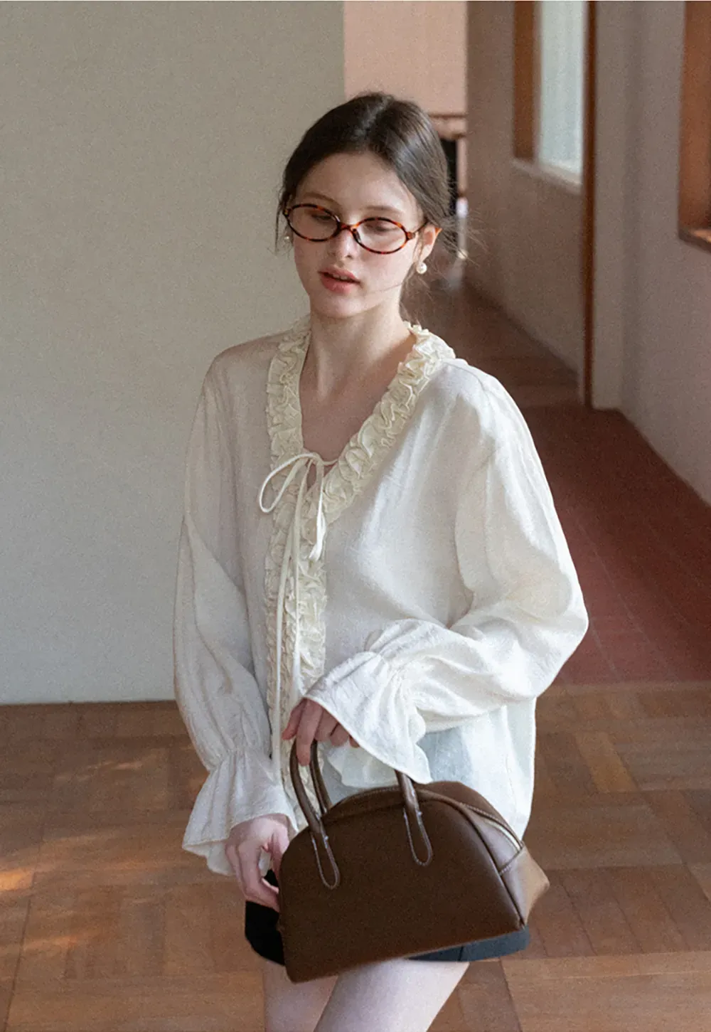 High waist pleated shorts with flared hem