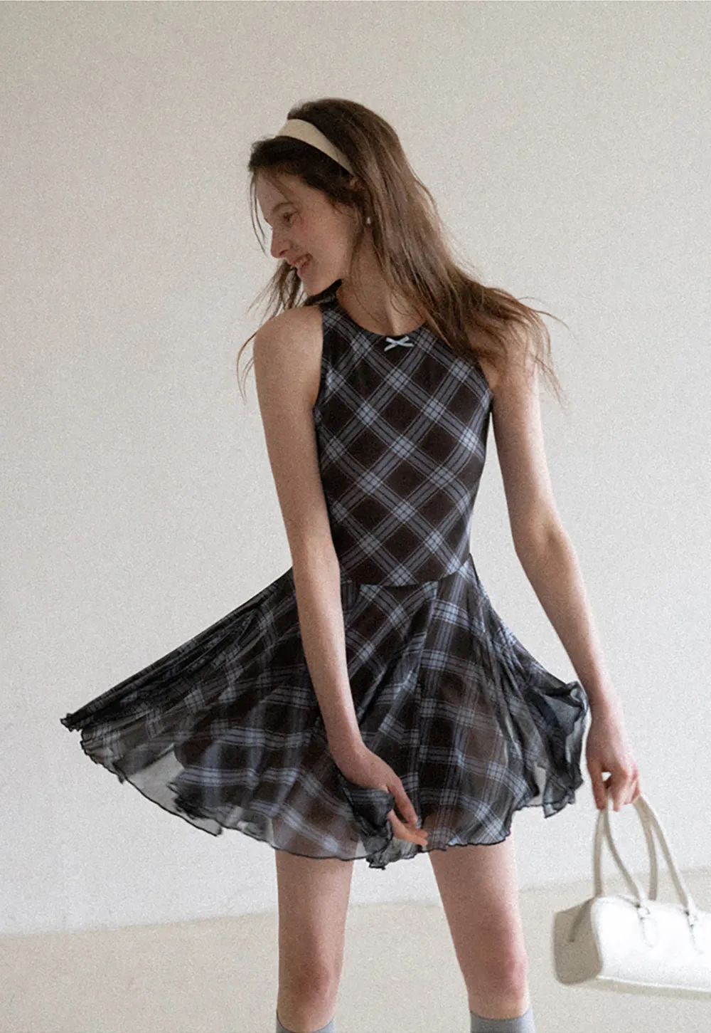 Plaid sleeveless dress with flared skirt