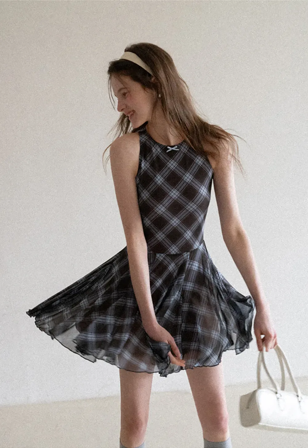 Plaid sleeveless dress with flared skirt