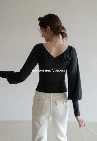 V neck long sleeve top with ruched detail