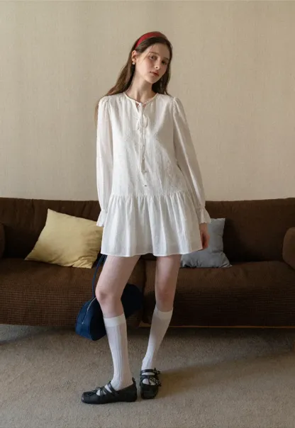 Elegant Long Sleeve Mini Dress with Flared Hem and Neck Tie