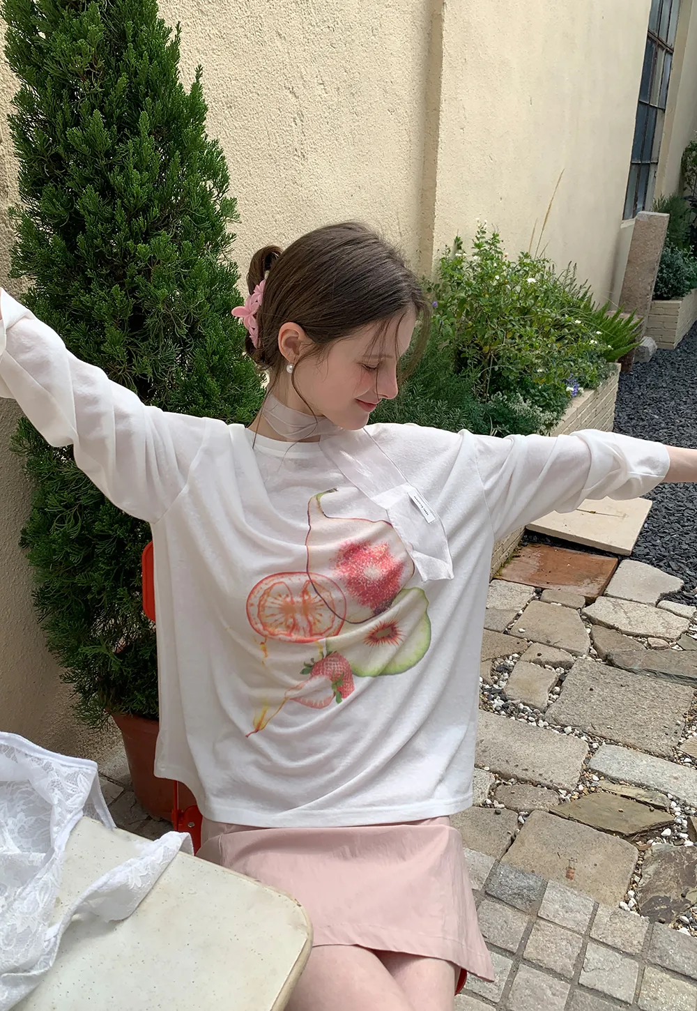 Oversized T shirt with fruit print and sheer neck detail