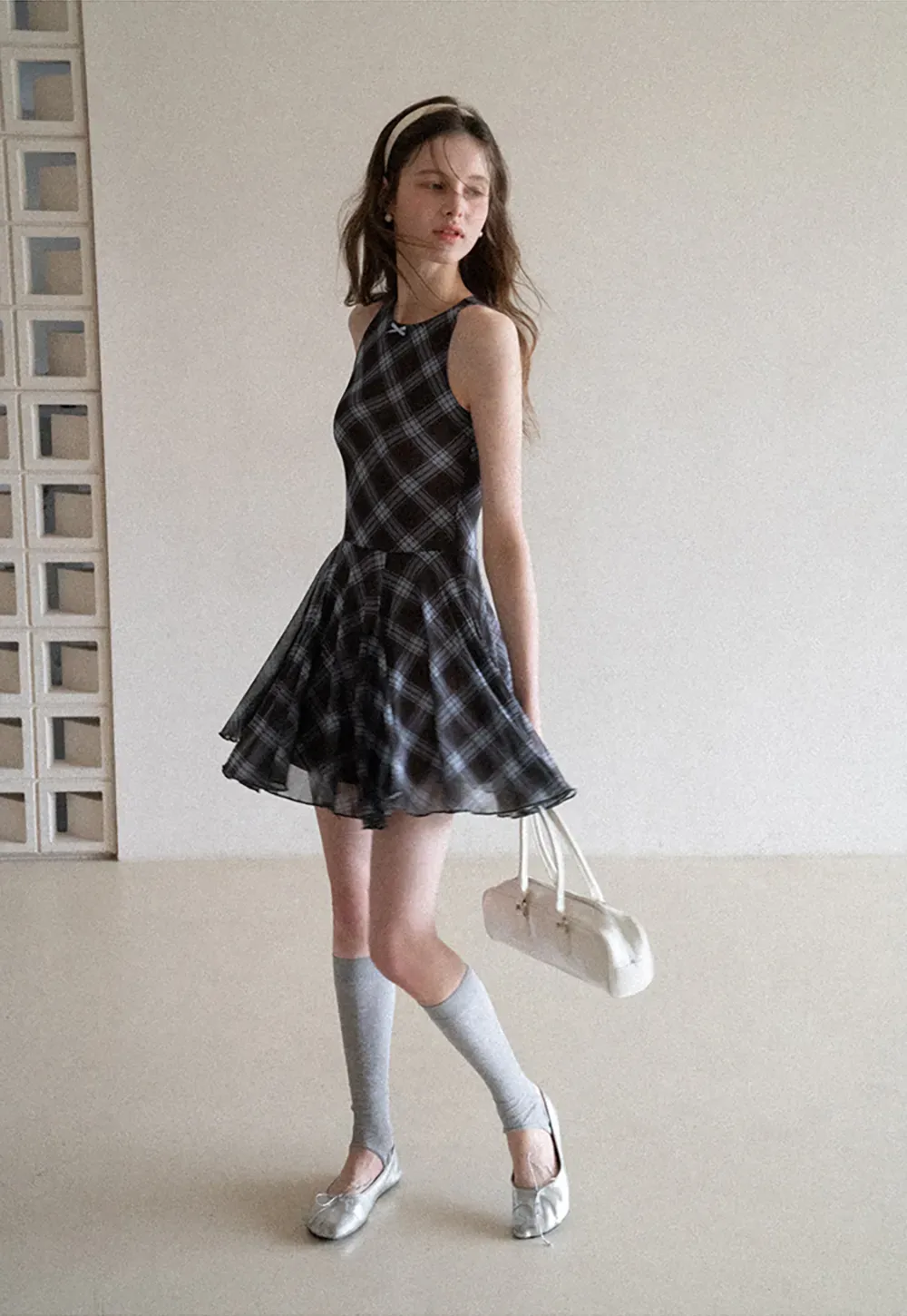 Plaid sleeveless dress with flared skirt