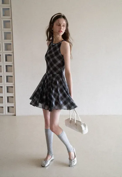 Plaid sleeveless dress with flared skirt