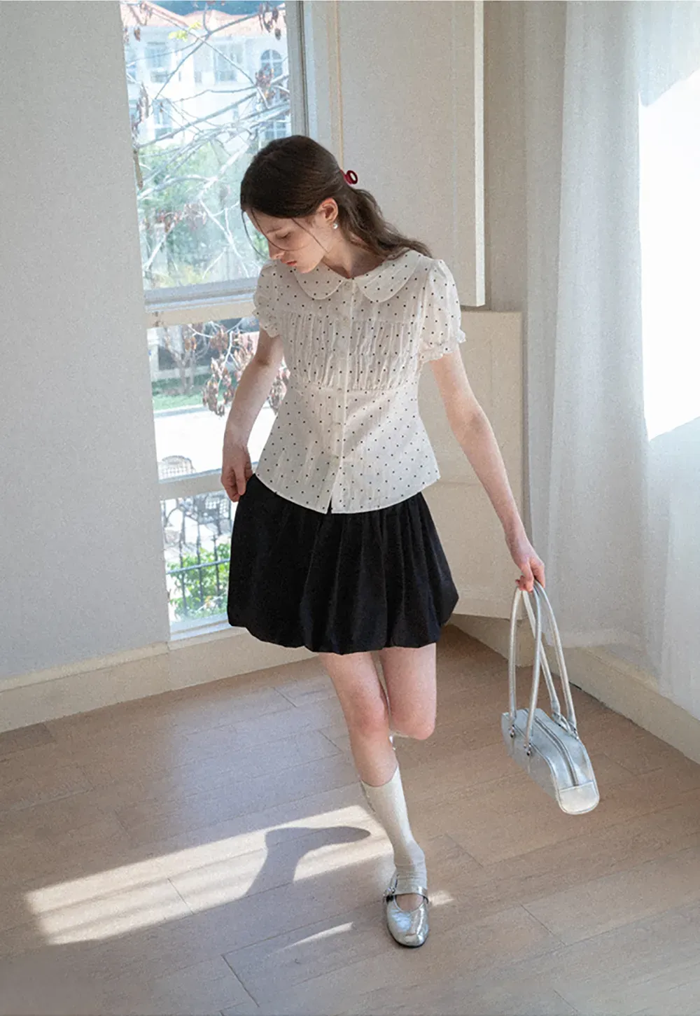 Polka dot shirt with ruffled sleeves and Peter Pan collar