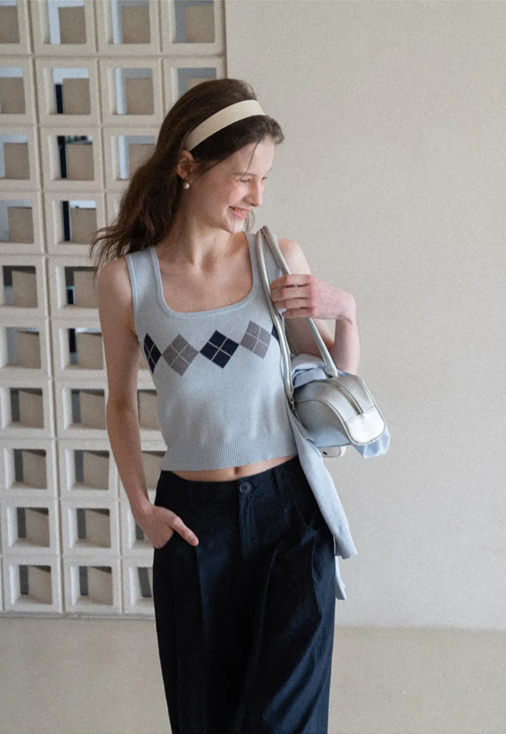 Woolen knit sweater with argyle pattern and buttons