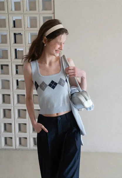 Woolen knit sweater with argyle pattern and buttons