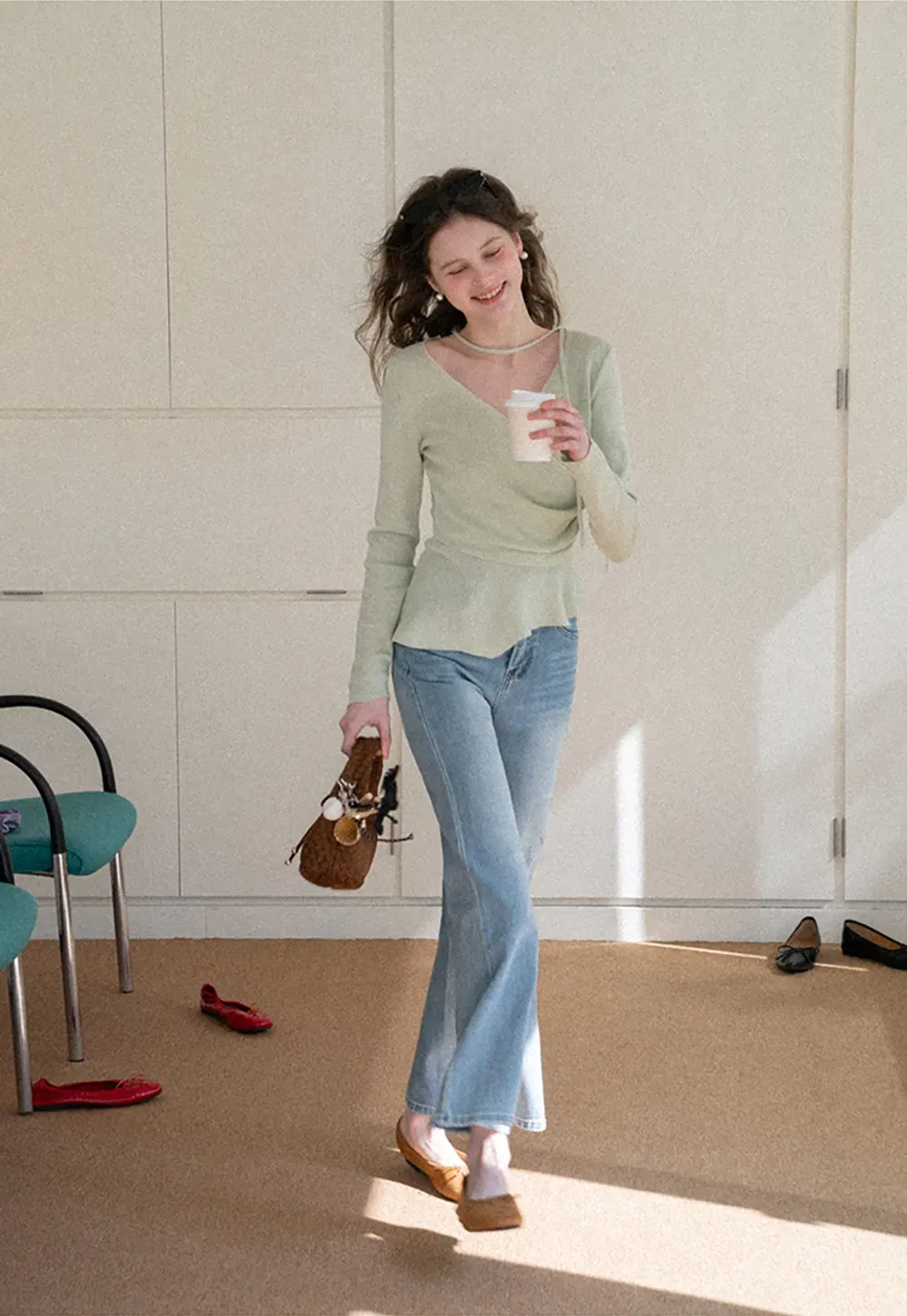 Long sleeve wrap knit sweater with ruched detail