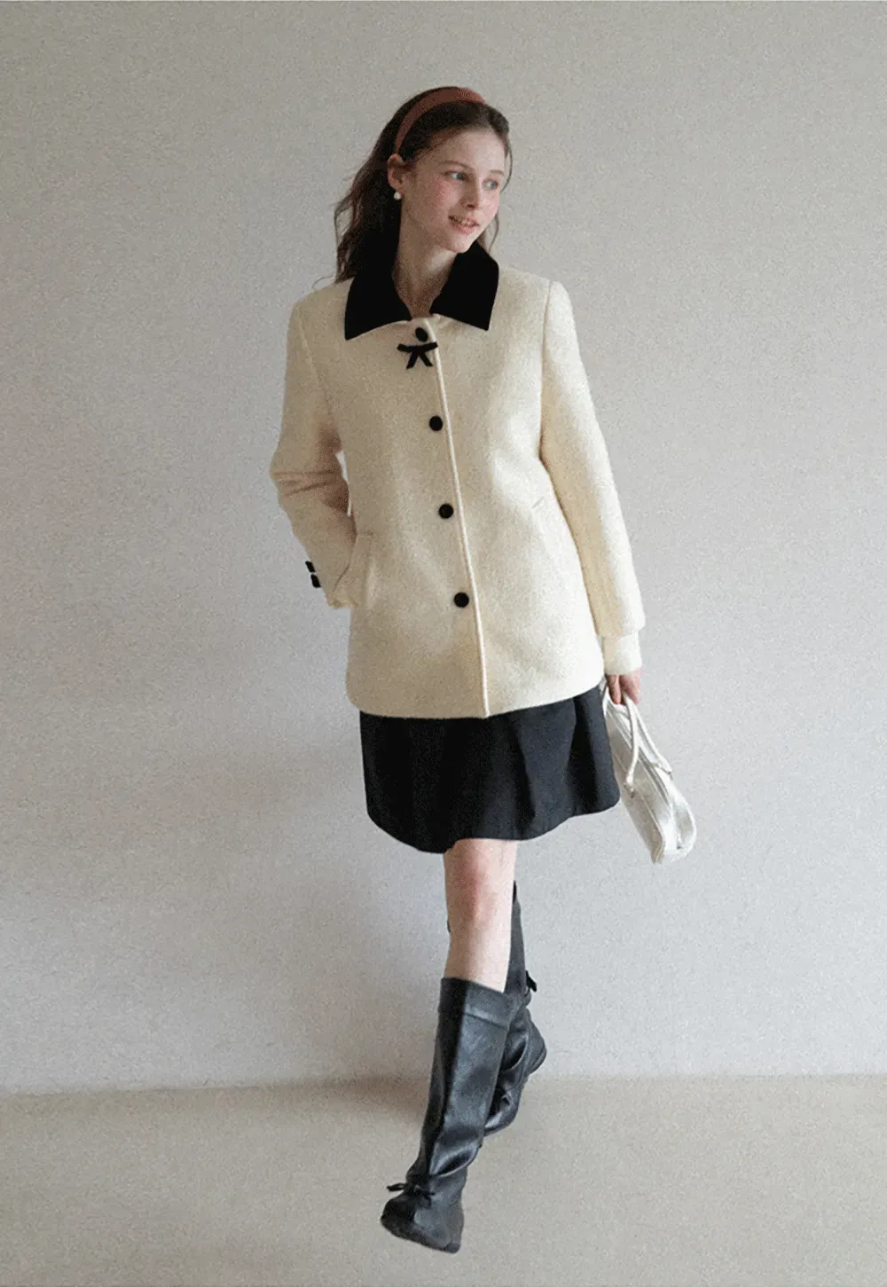Elegant Wool Coat with Bow Detail and Contrasting Collar