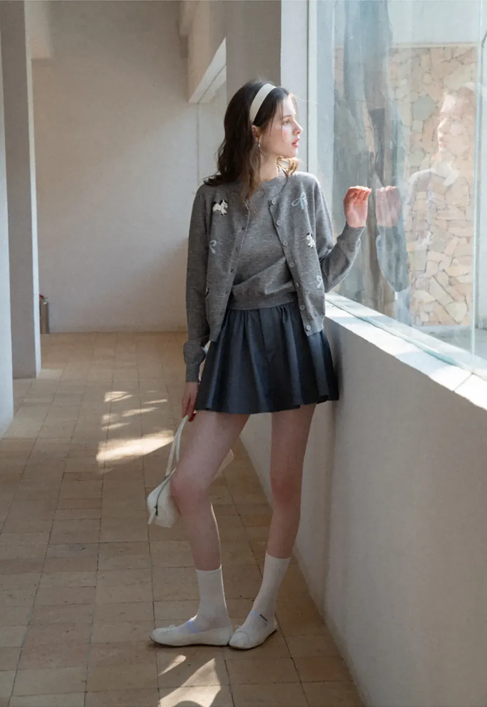 Woolen knit sweater with horse and bow motifs