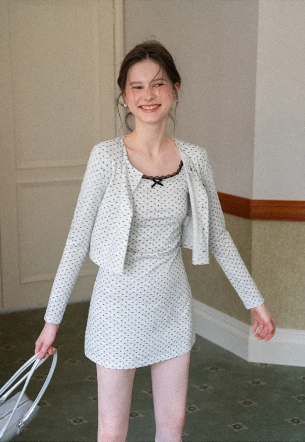 Polka dot dress with lace trim and matching cardigan