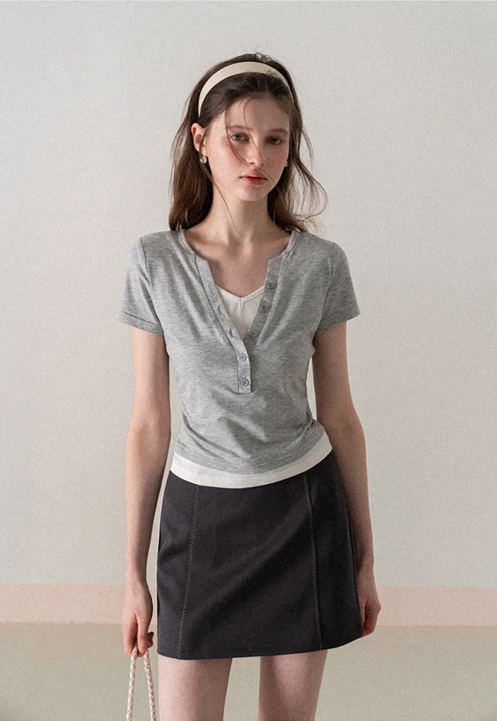 A-line mini skirt with contrast stitching and belt