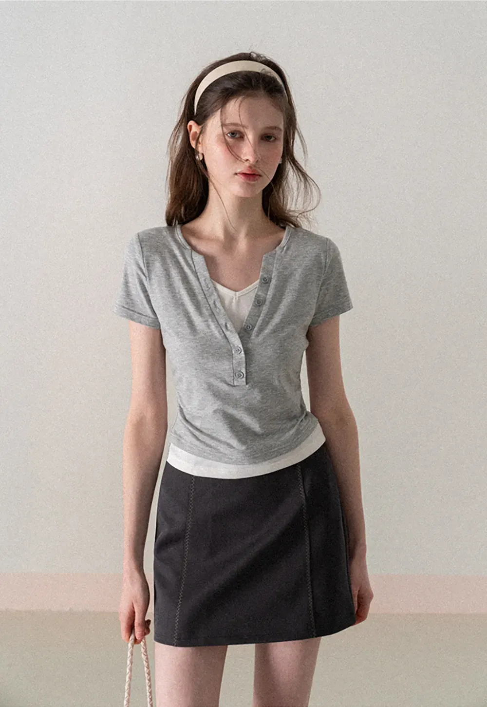 A-line mini skirt with contrast stitching and belt