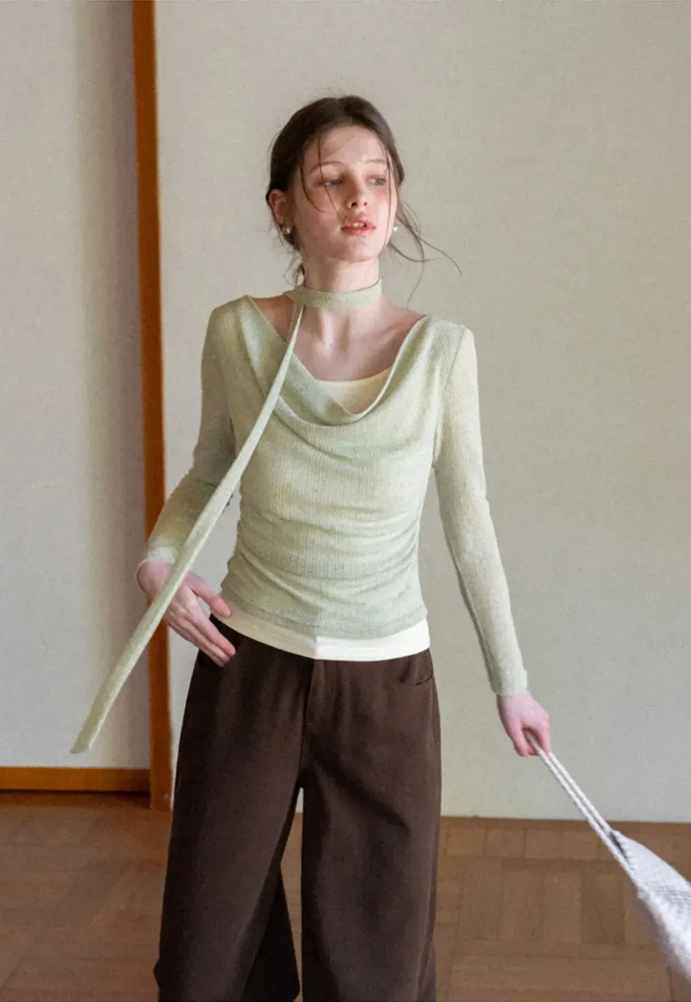 Long sleeve knit top with back tie detail