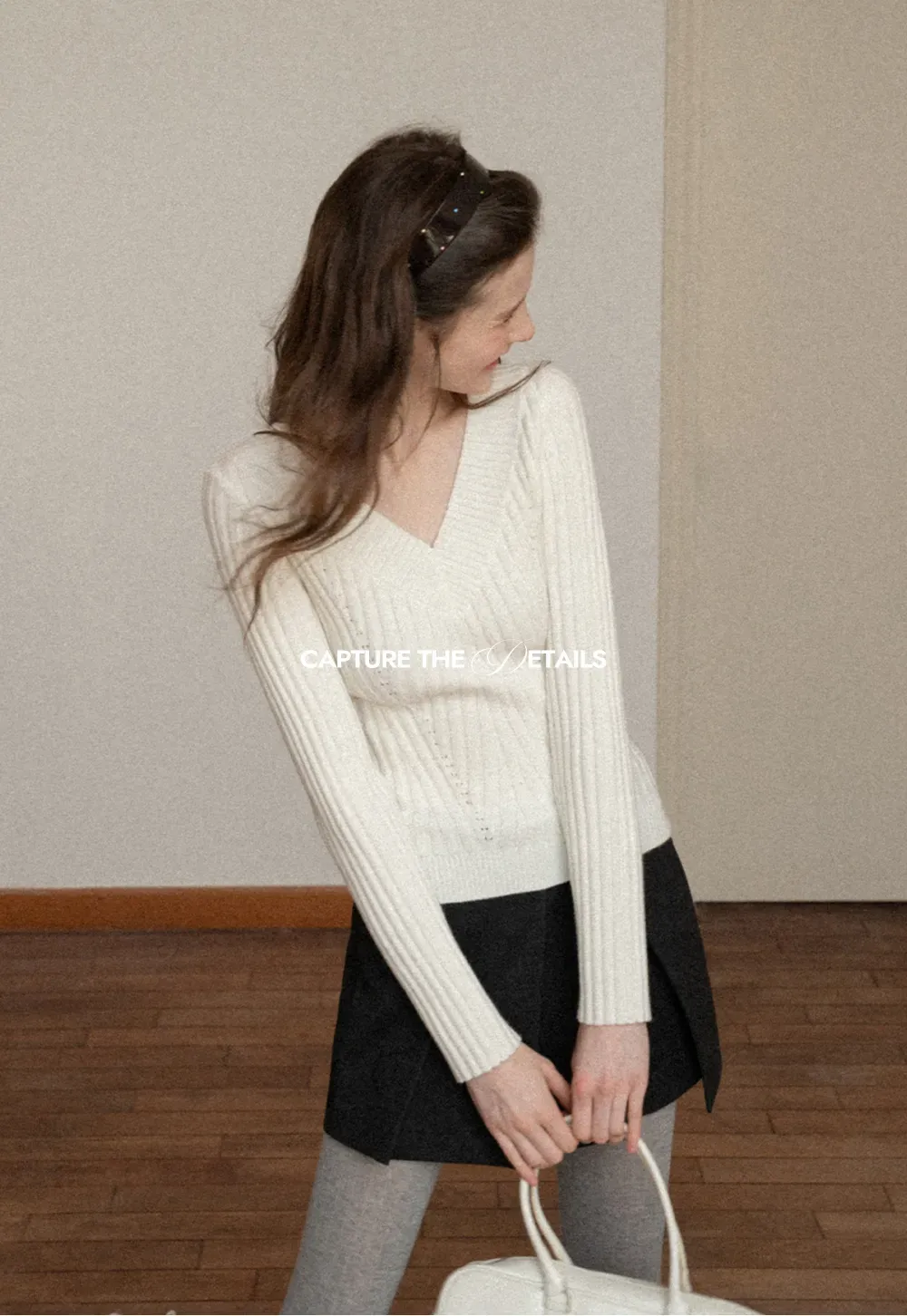 Elegant Ribbed Knit Sweater with V-Neck Design