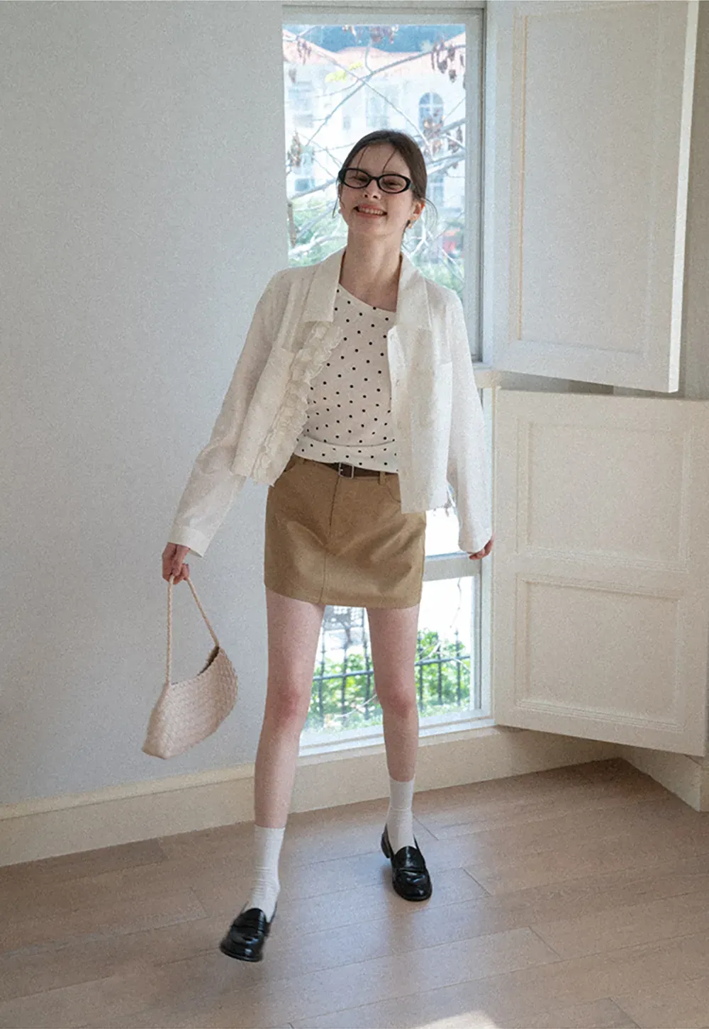 Short jacket with ruffled front placket and collar