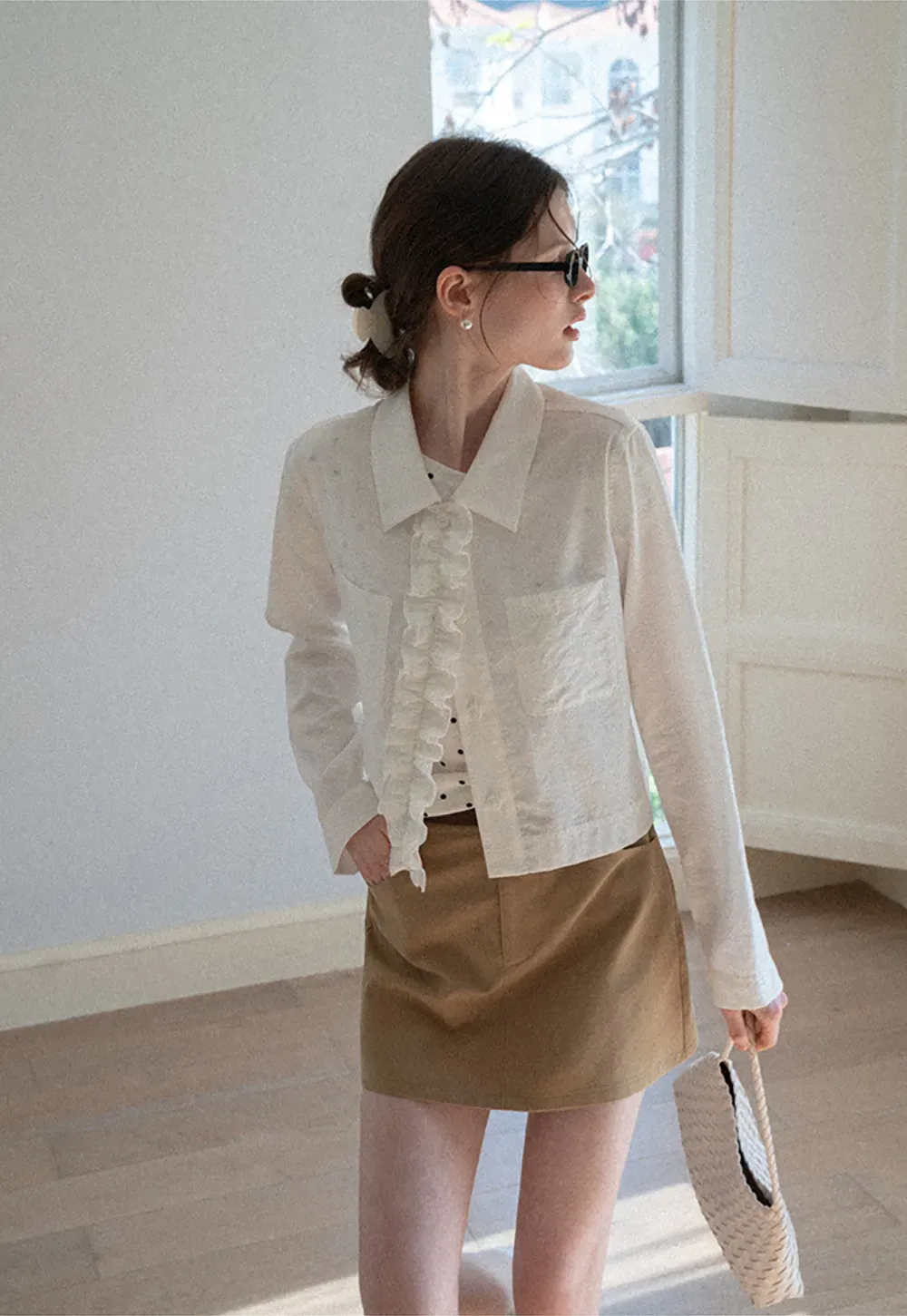 Short jacket with ruffled front placket and collar