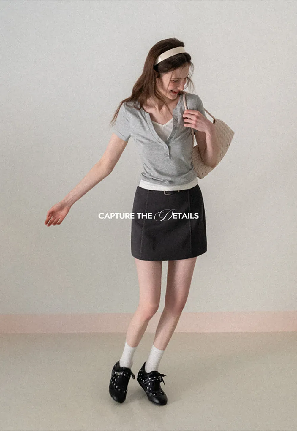 A-line mini skirt with contrast stitching and belt