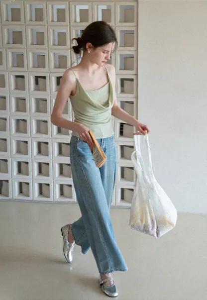 Silk-like tank top with thin straps and draped neckline