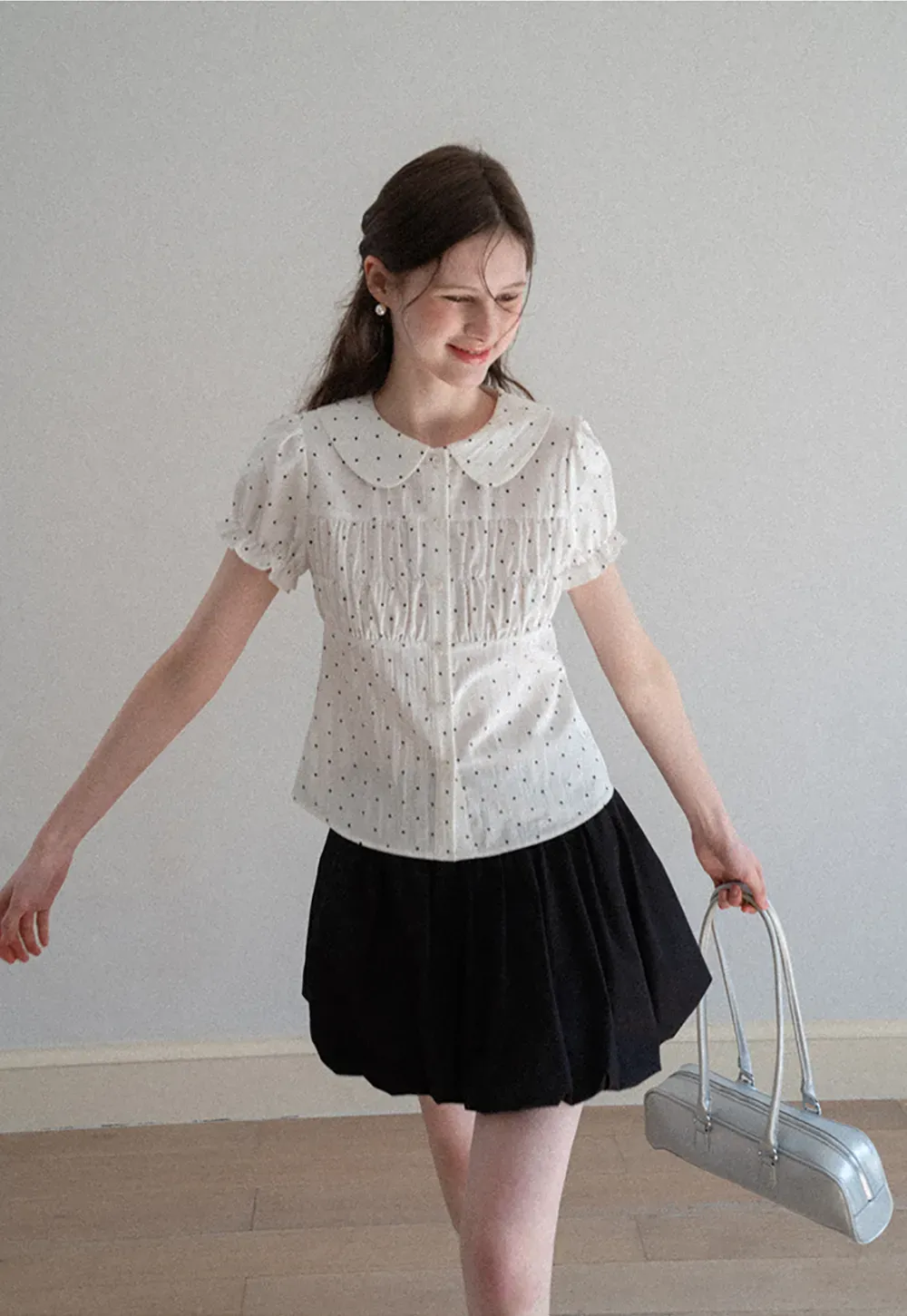 Polka dot shirt with ruffled sleeves and Peter Pan collar