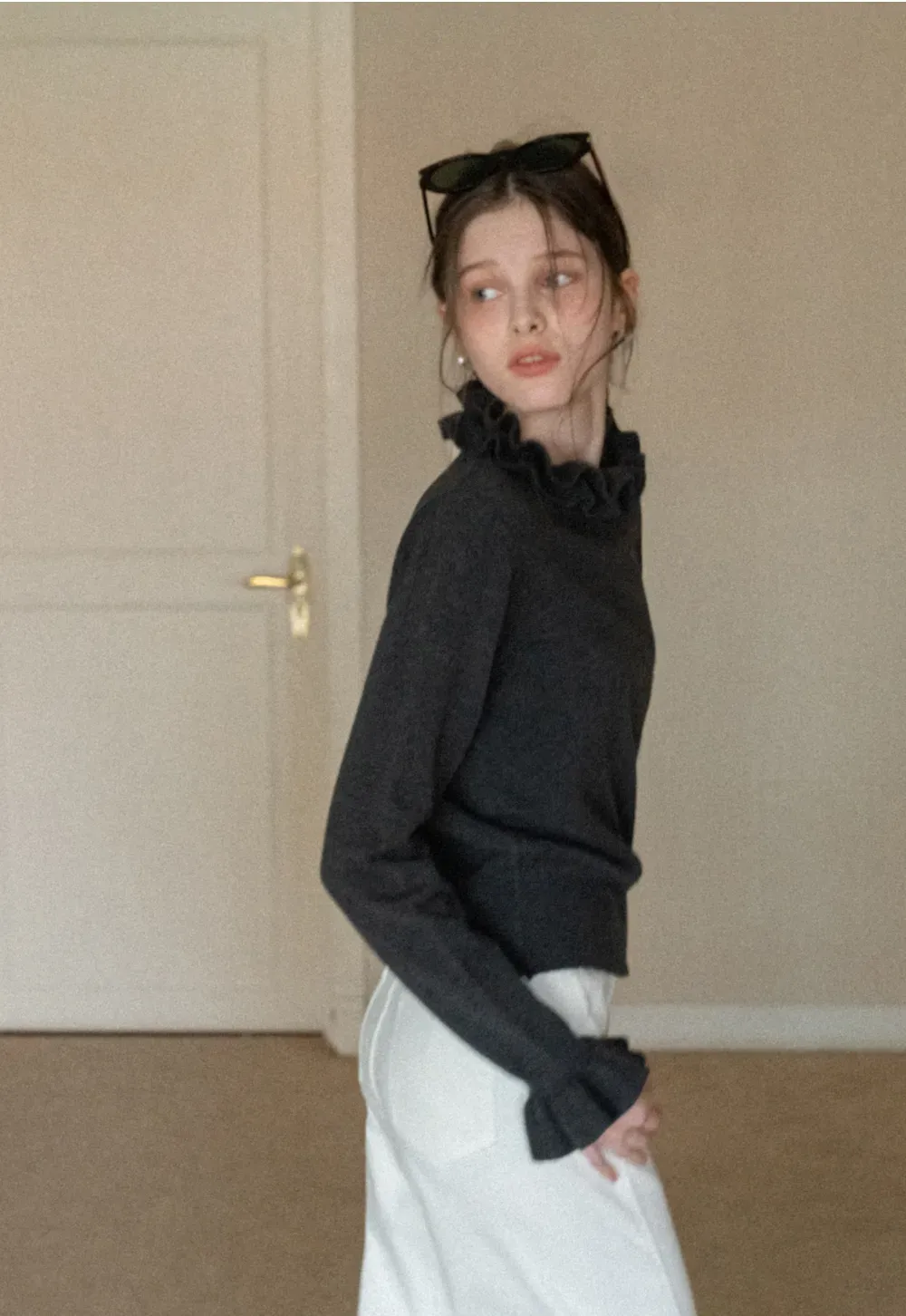 Elegant Ruffle Detail Knit Sweater with Flared Cuffs and Neckline