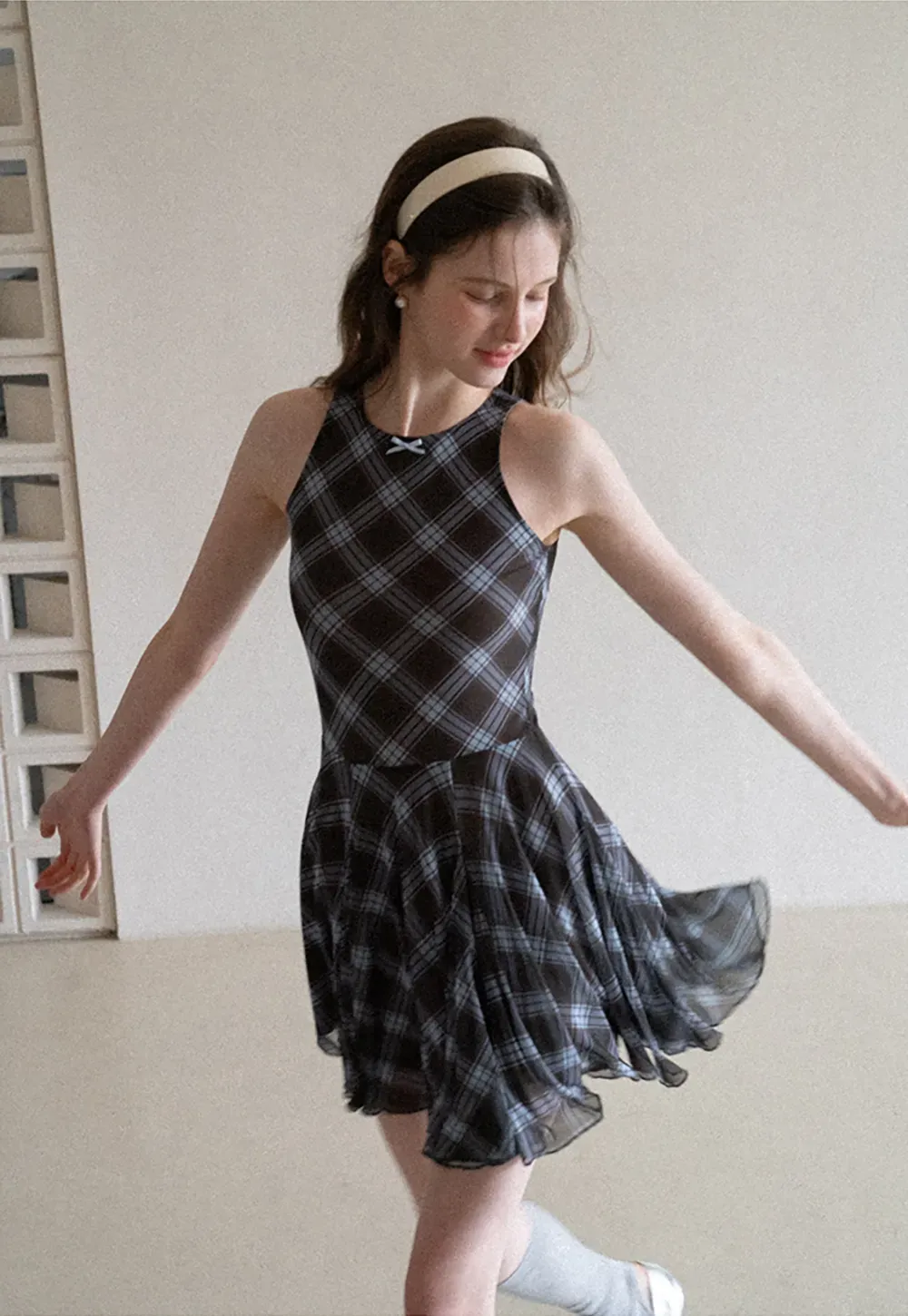 Plaid sleeveless dress with flared skirt