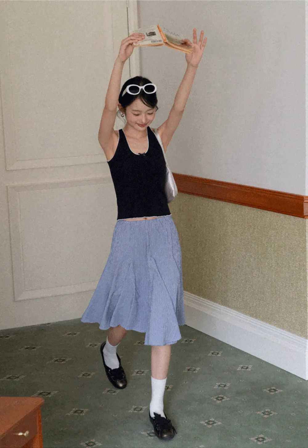 Halter neck tank top with thin straps and bow detail