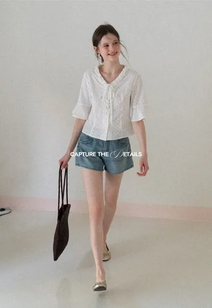 V neck blouse with lace trim and tie front