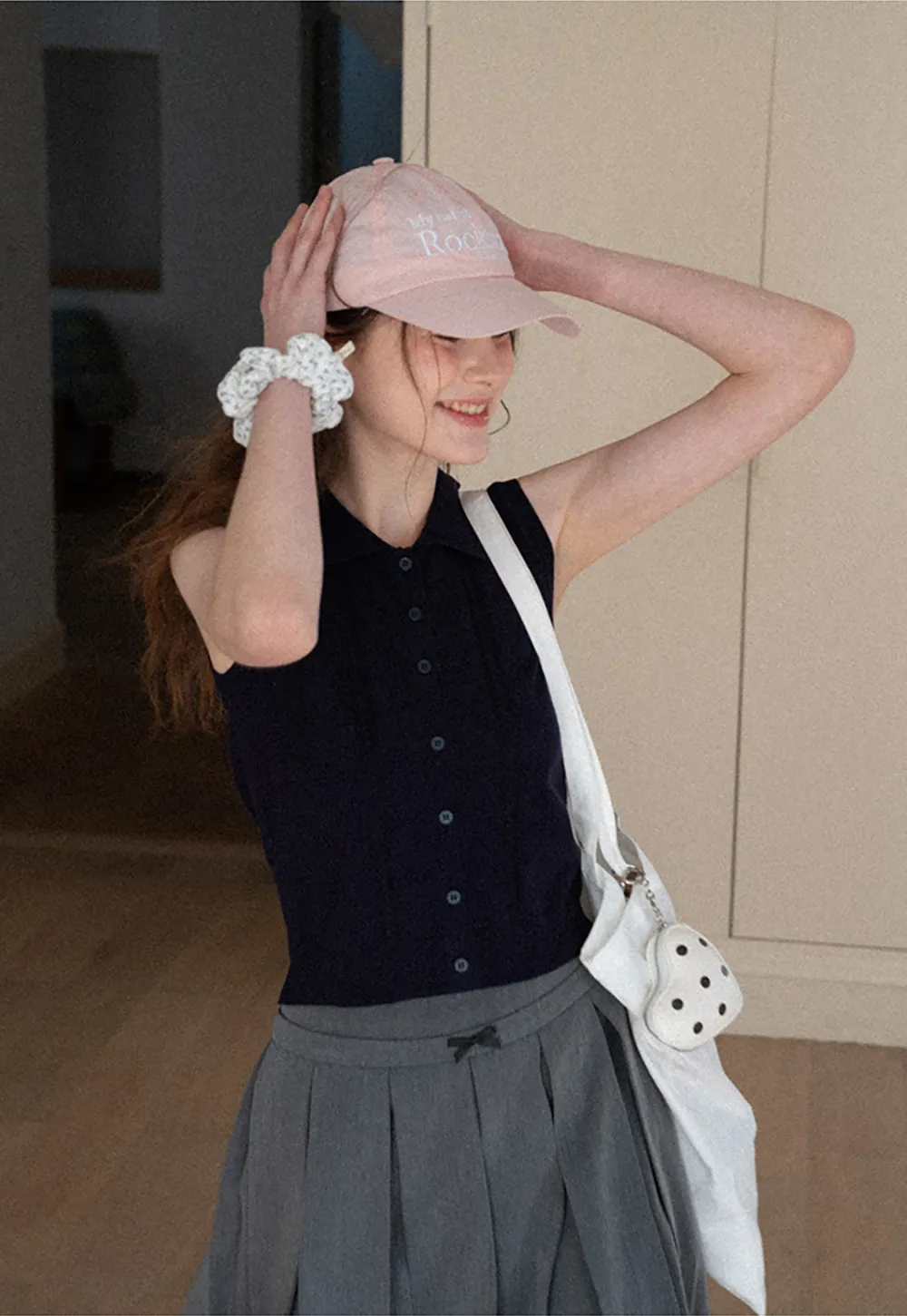 Pleated skirt with front bow detail