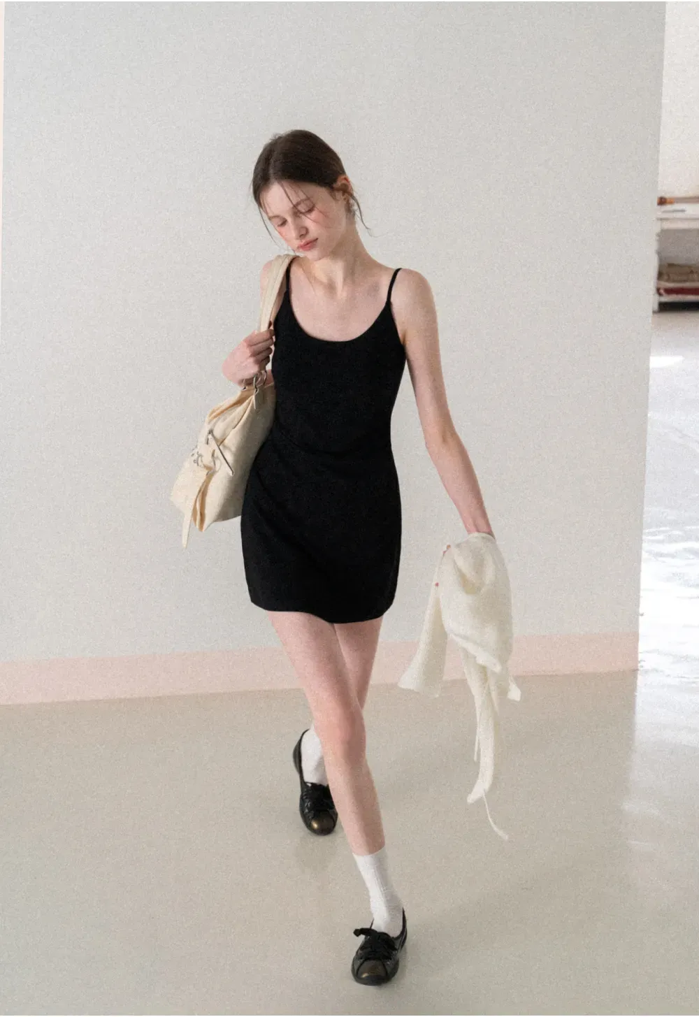 Sleeveless fitted mini dress with thin straps