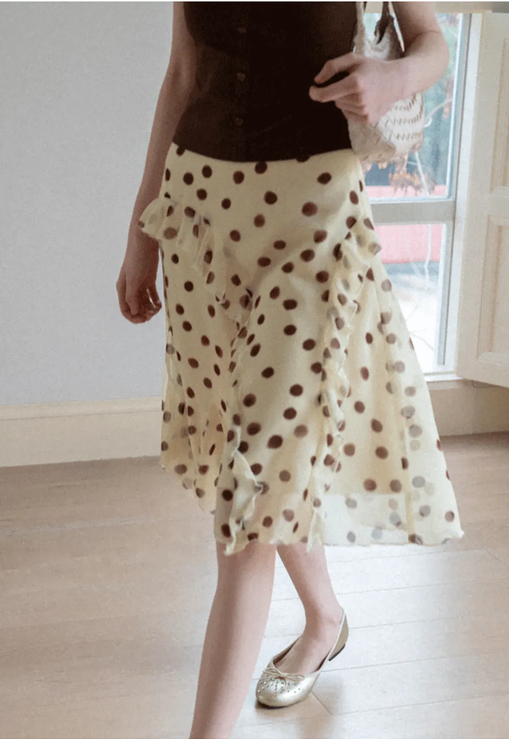 Polka dot ruffled asymmetrical midi skirt