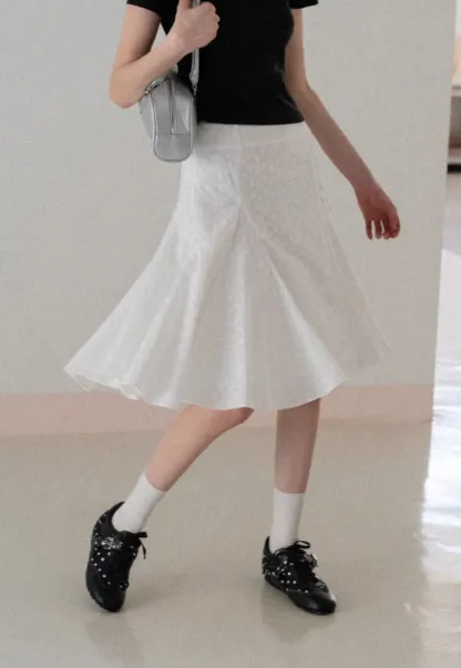 Flared pleated skirt with subtle texture