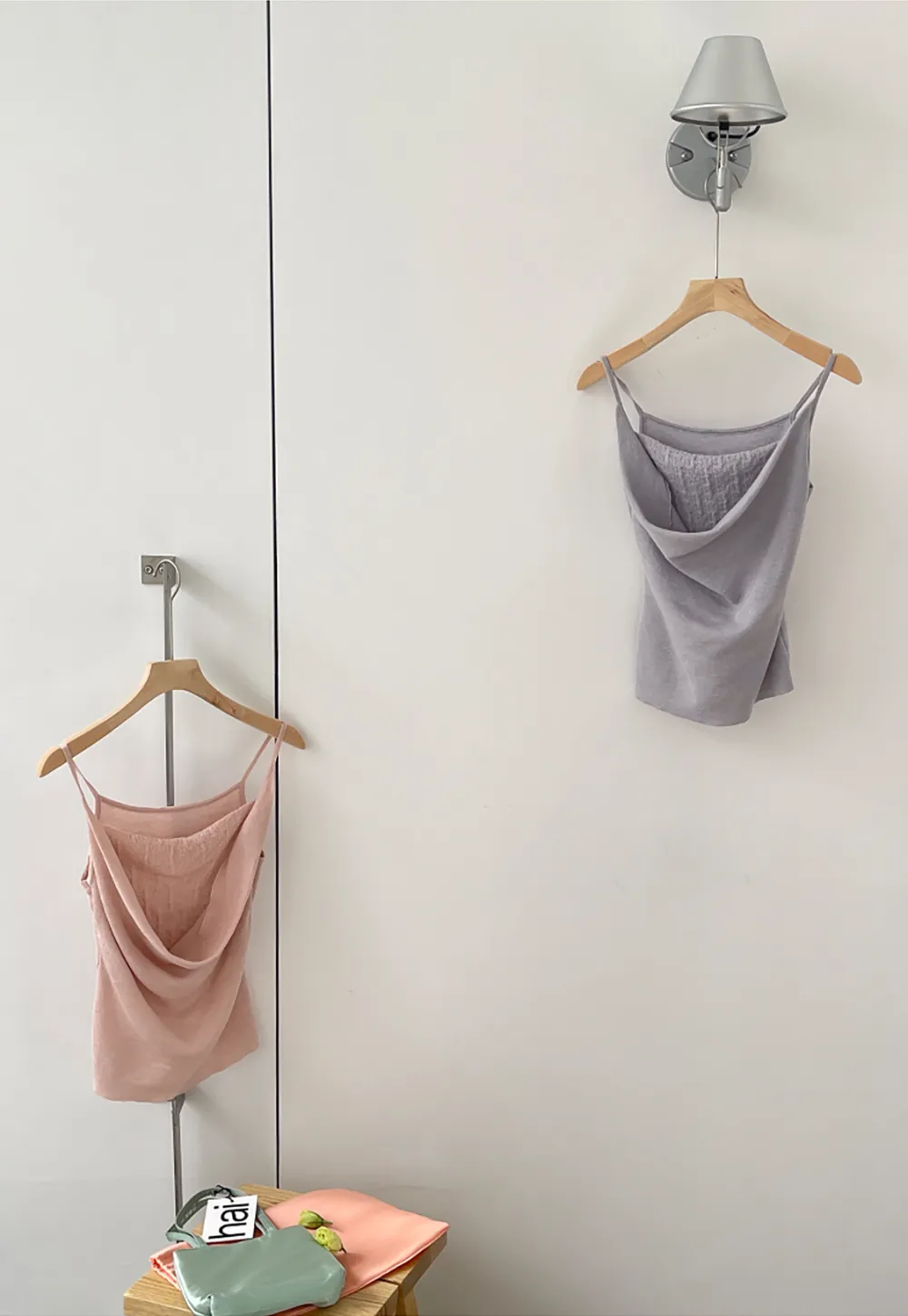 Silk-like tank top with thin straps and draped neckline