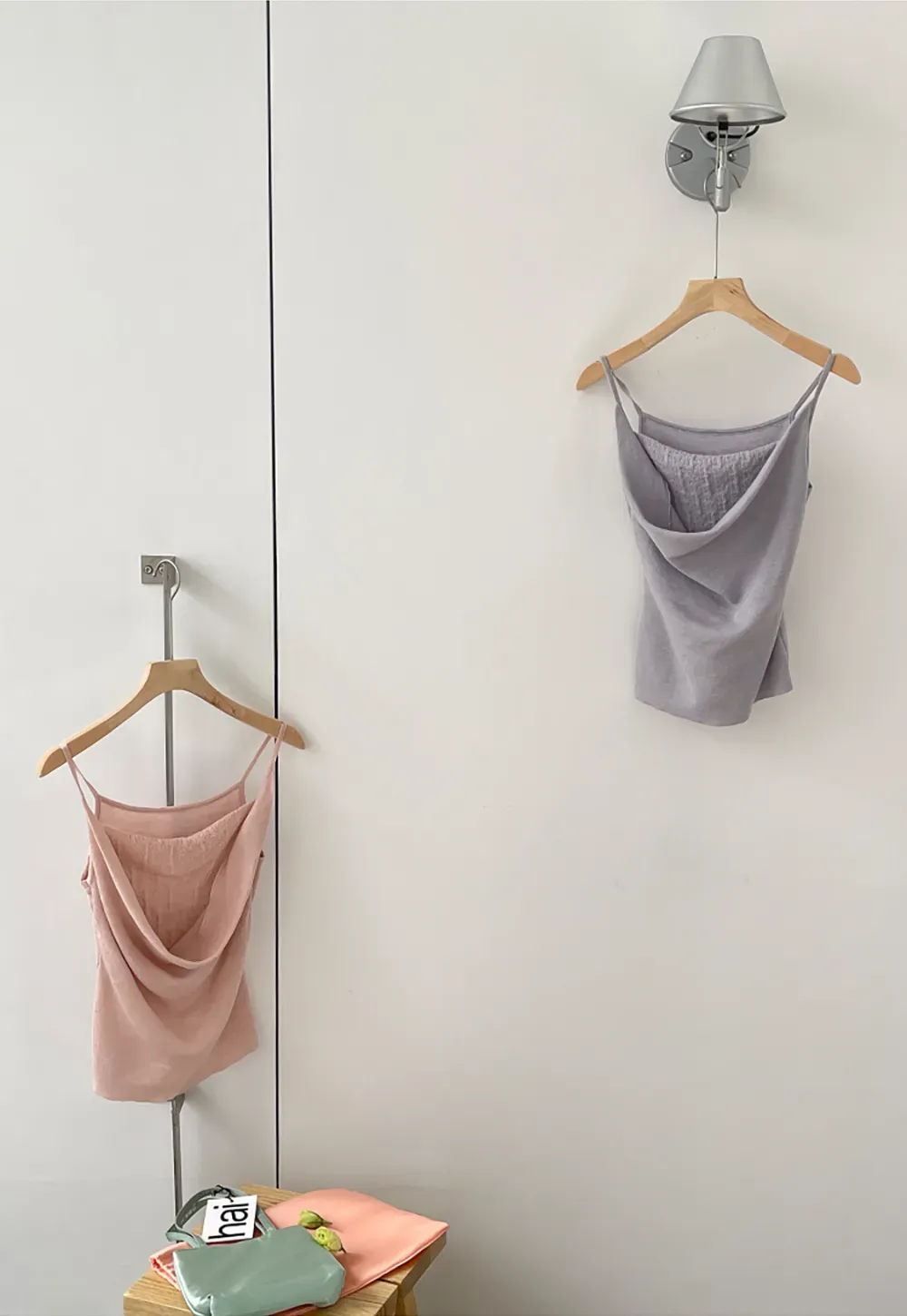 Silk-like tank top with thin straps and draped neckline