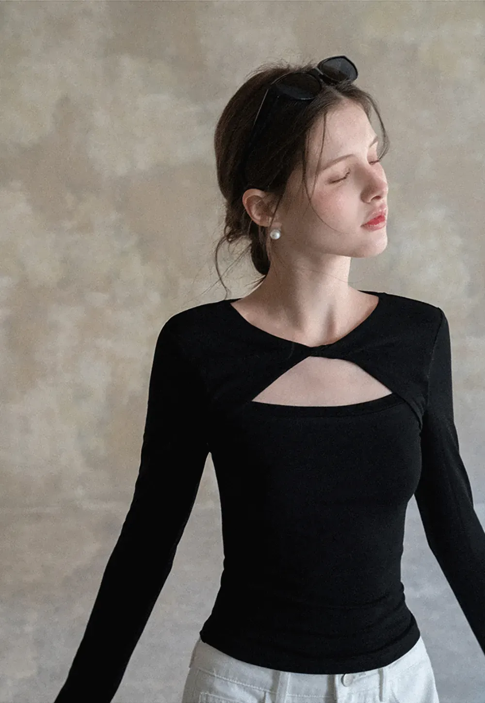 Long sleeve top with front cutout detail