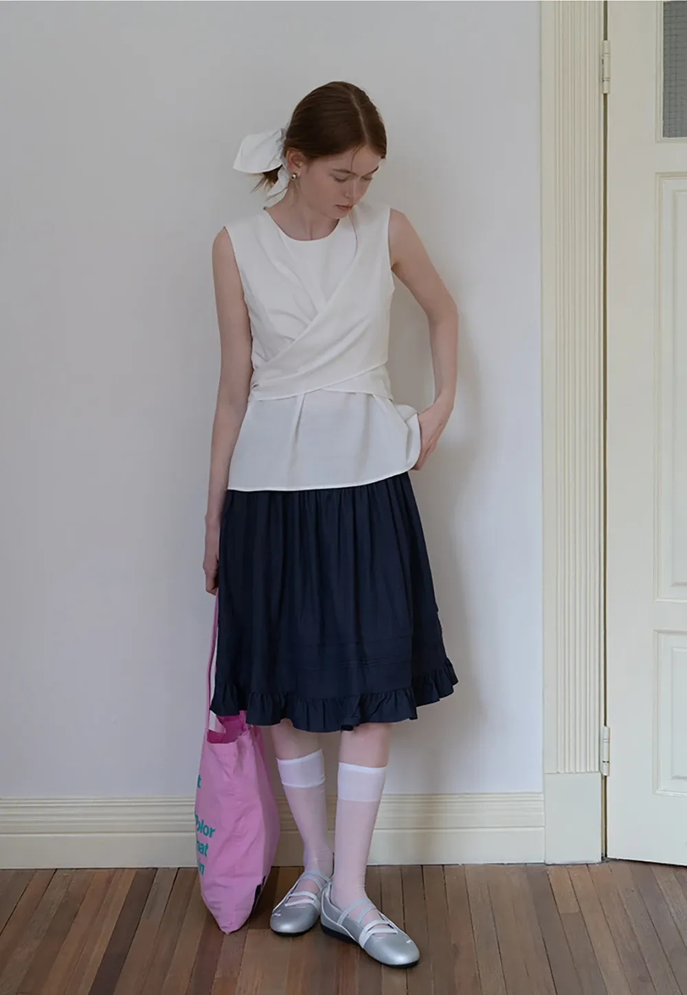 Women’s Twist-Front Sleeveless Peplum Top
