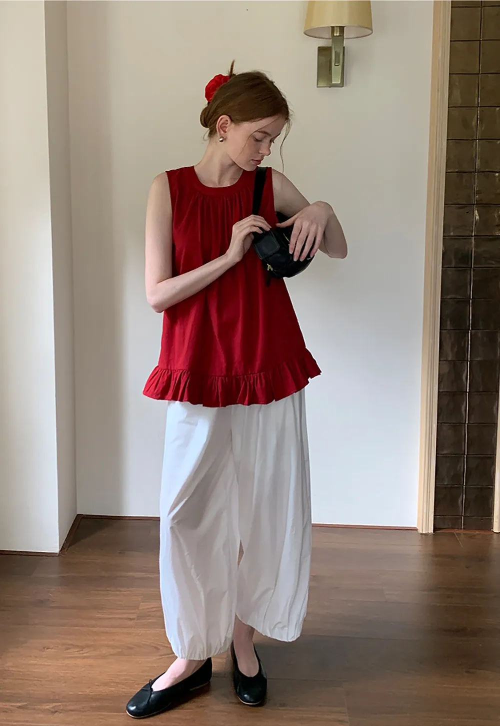 Women’s Sleeveless Ruffle Hem Top with Back Bow Tie