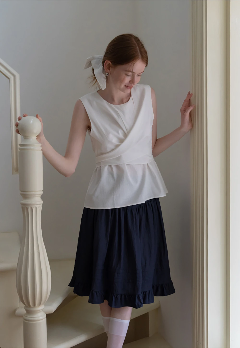 Women’s Twist-Front Sleeveless Peplum Top