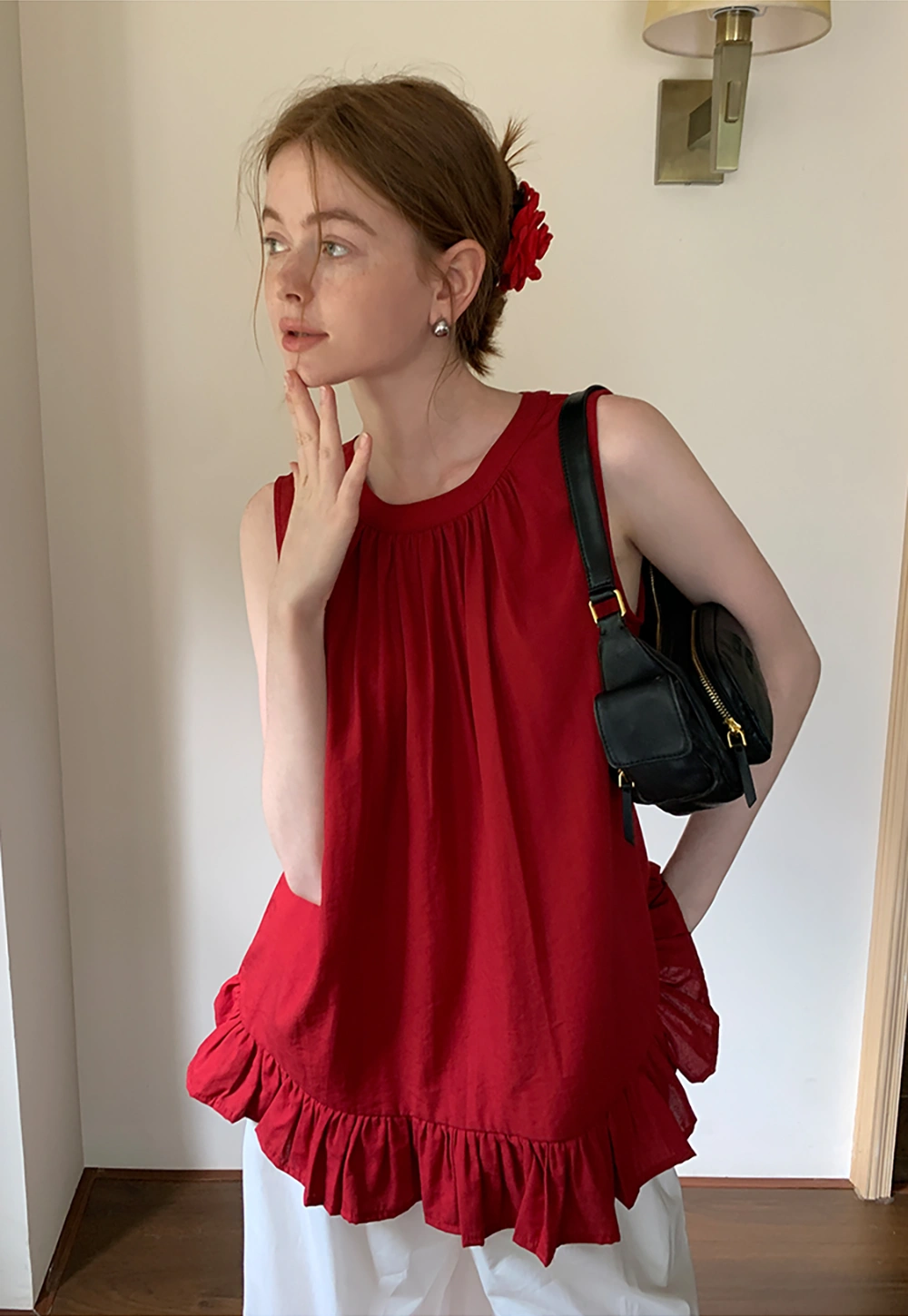 Women’s Sleeveless Ruffle Hem Top with Back Bow Tie
