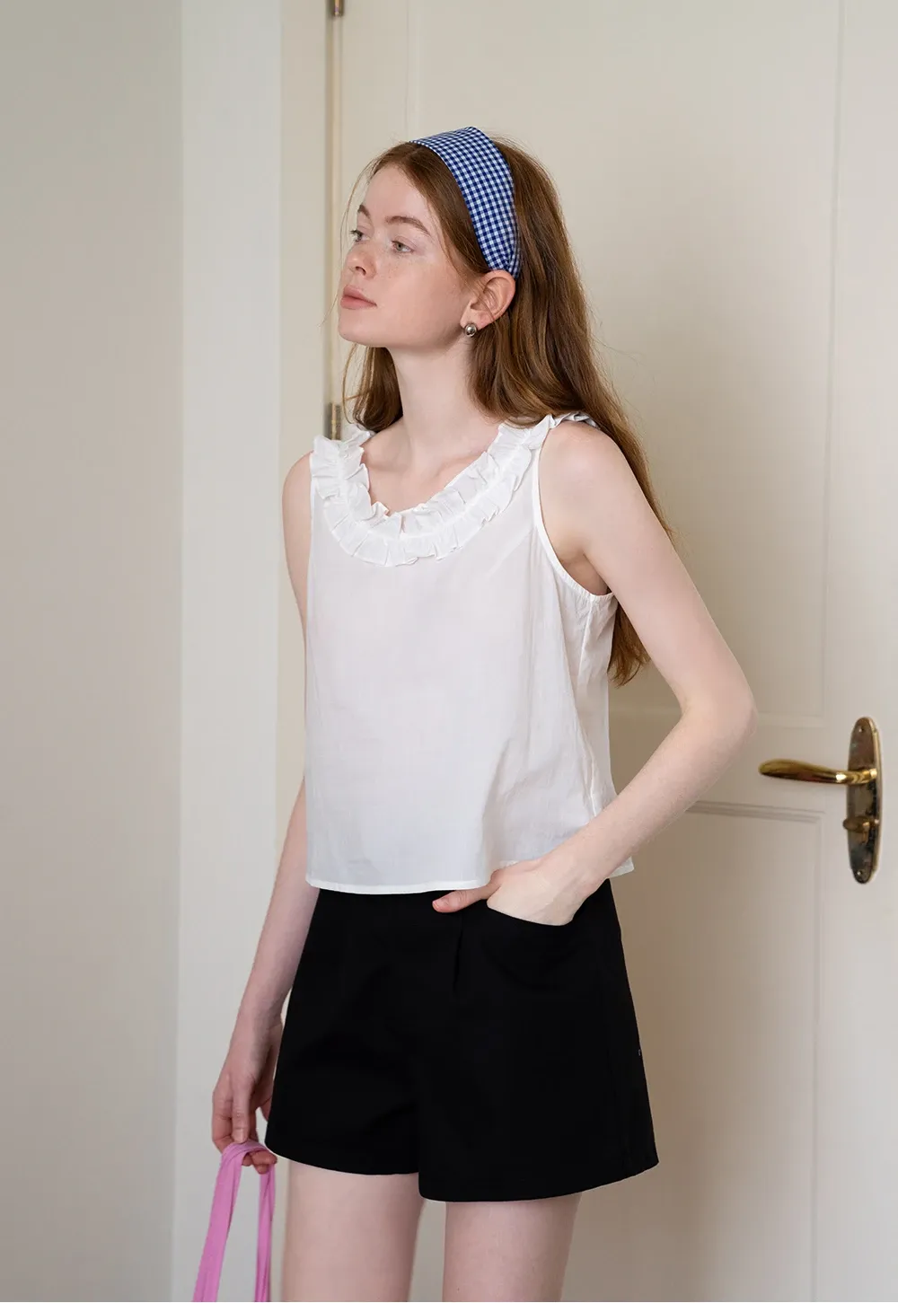Women’s Sleeveless Top with Ruffle Neckline