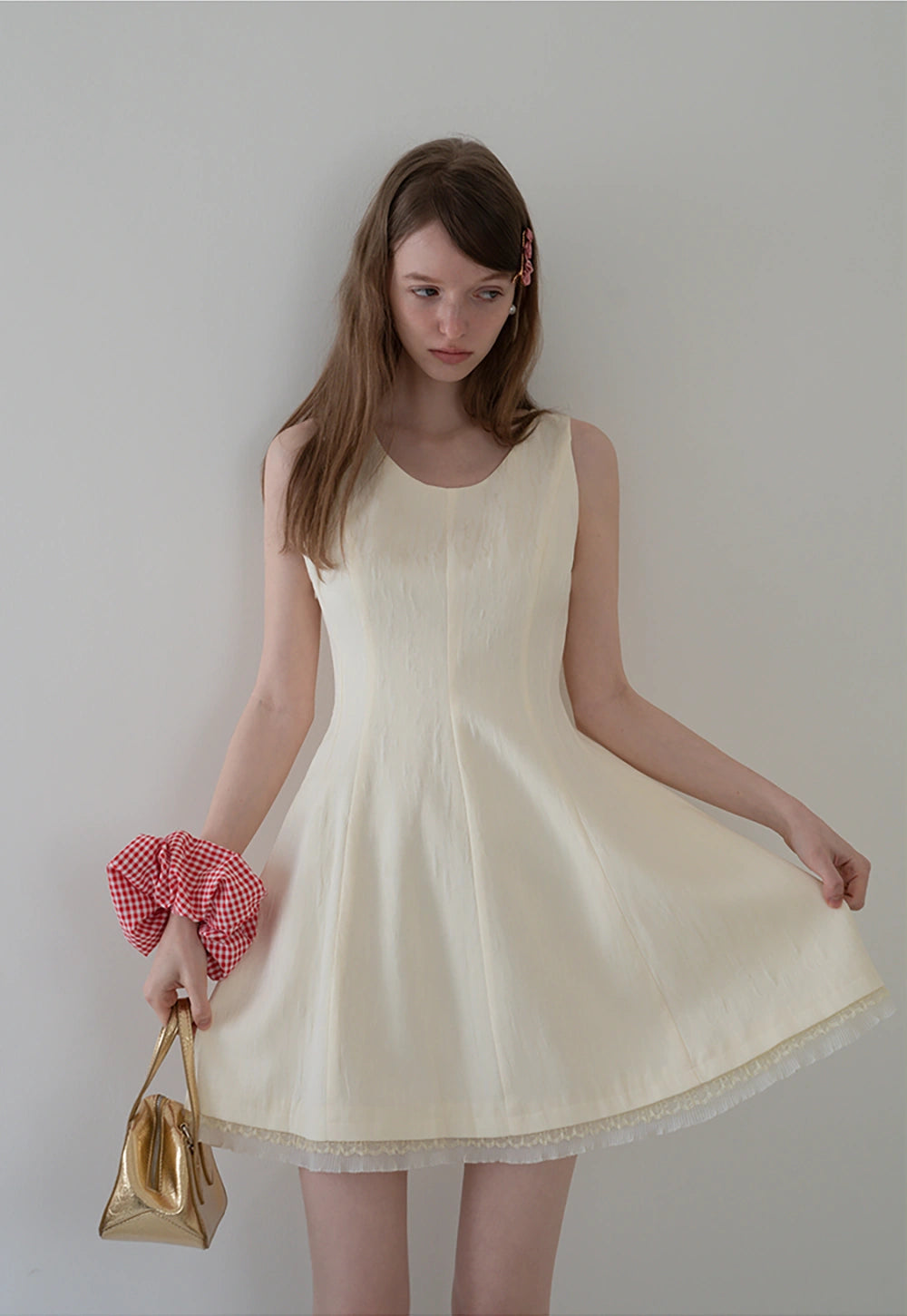 Sleeveless Textured A-Line Dress with Lace Hem