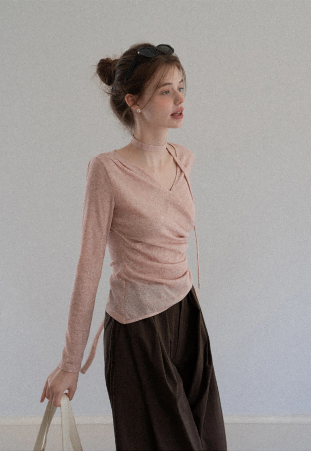 Asymmetrical rap-front draped knit top