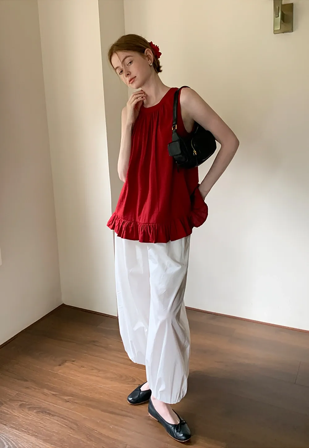 Women’s Sleeveless Ruffle Hem Top with Back Bow Tie