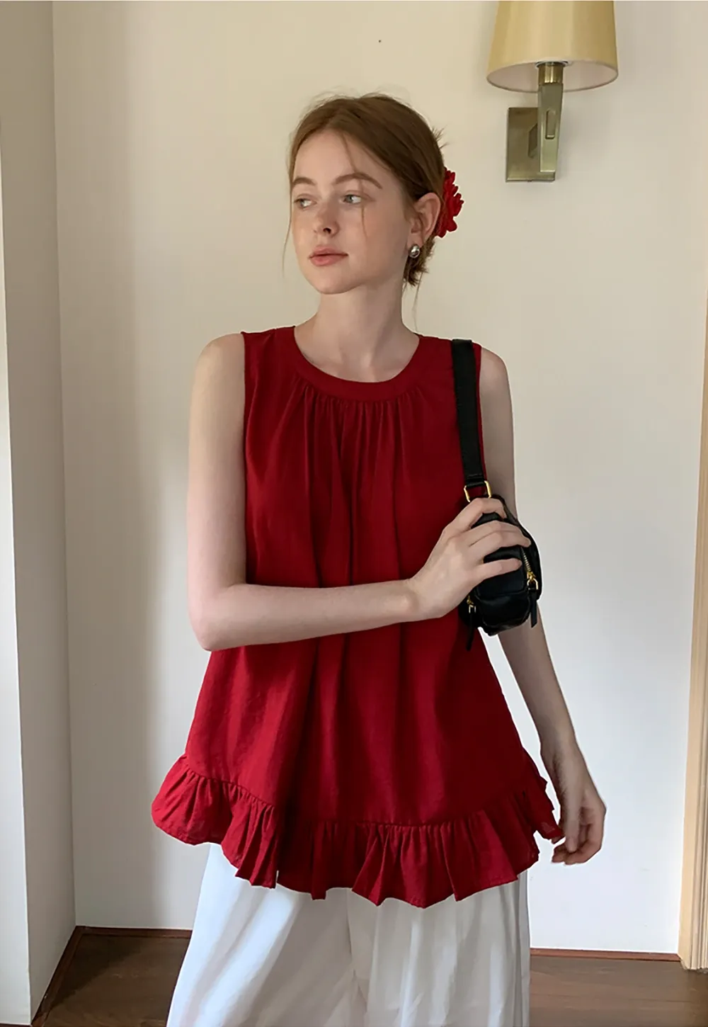 Women’s Sleeveless Ruffle Hem Top with Back Bow Tie