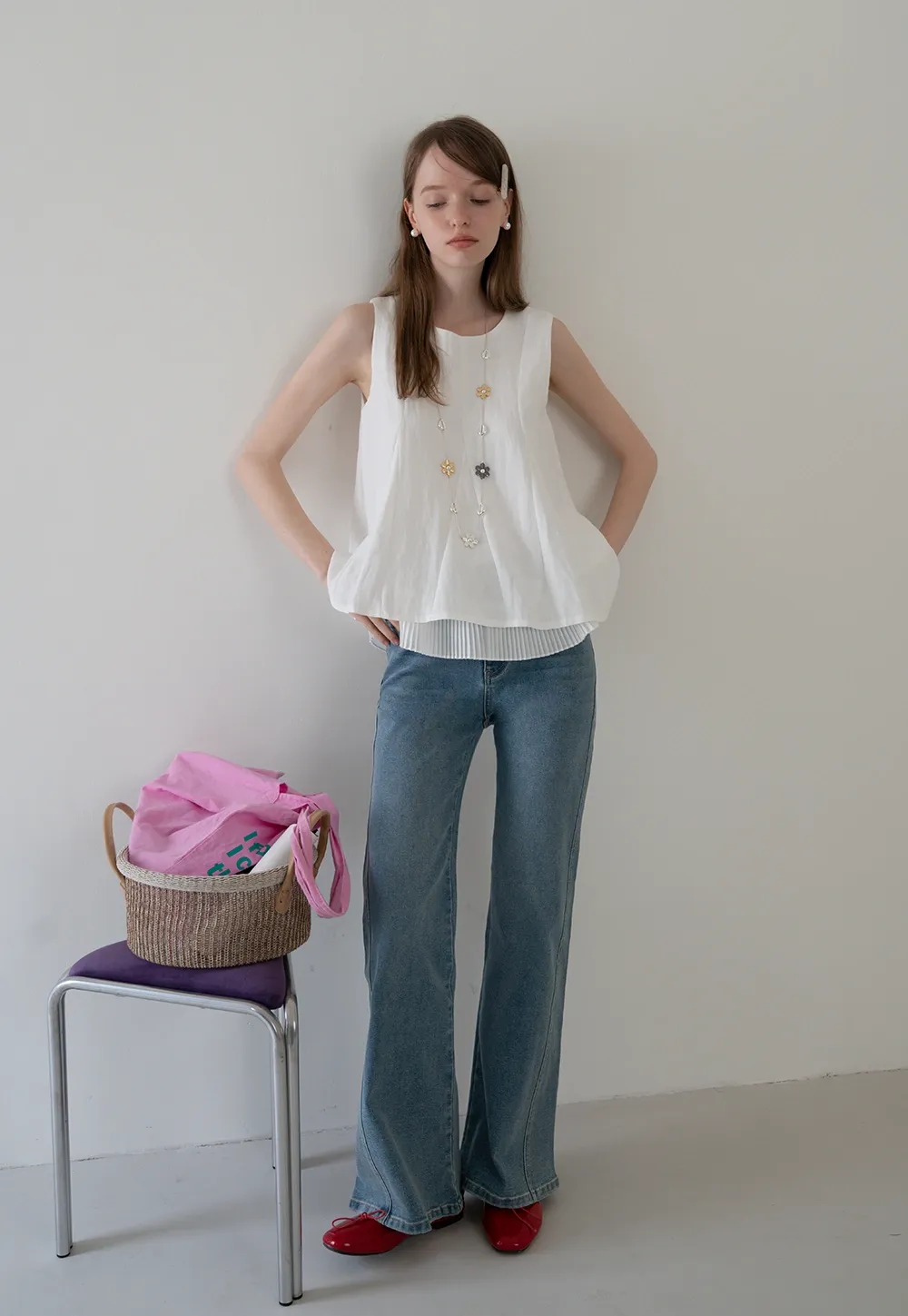 Women's Sleeveless Pleated Hem Blouse