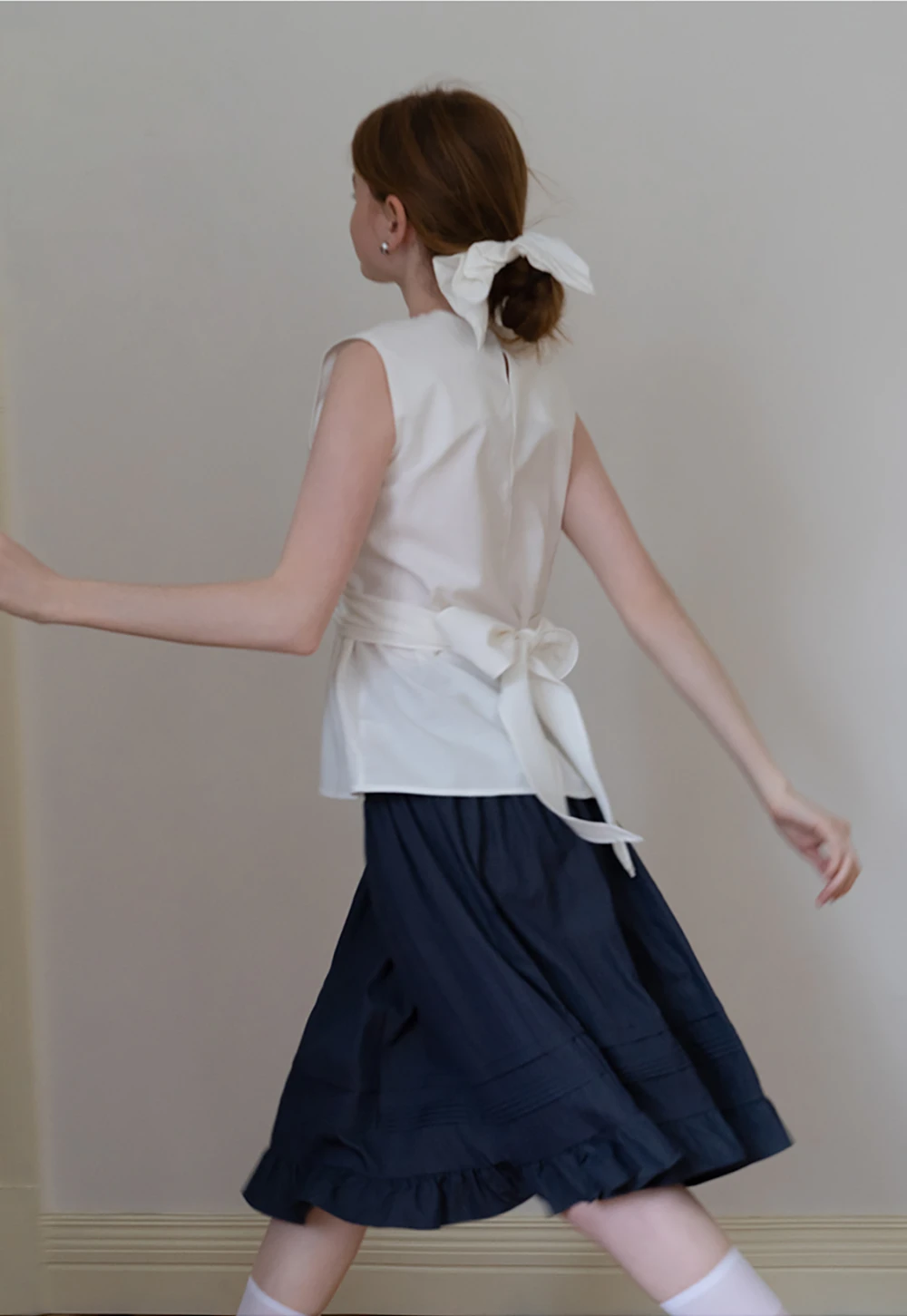 Women’s Twist-Front Sleeveless Peplum Top